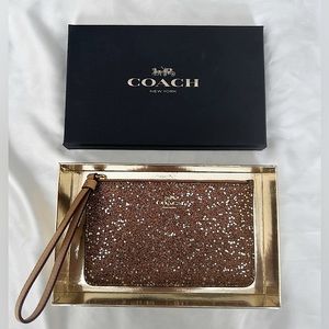 Coach Rose Gold Wristlet🤩